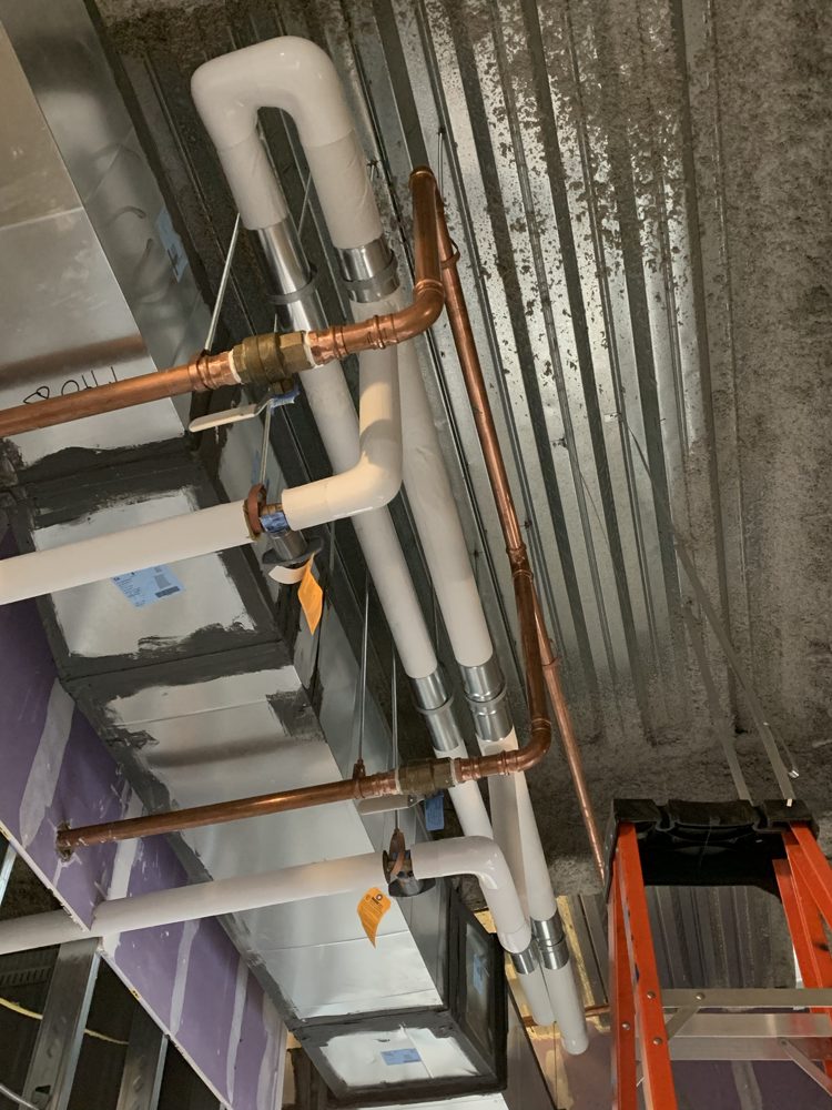 Domestic water piping, fiberglass with PVC fitting covers