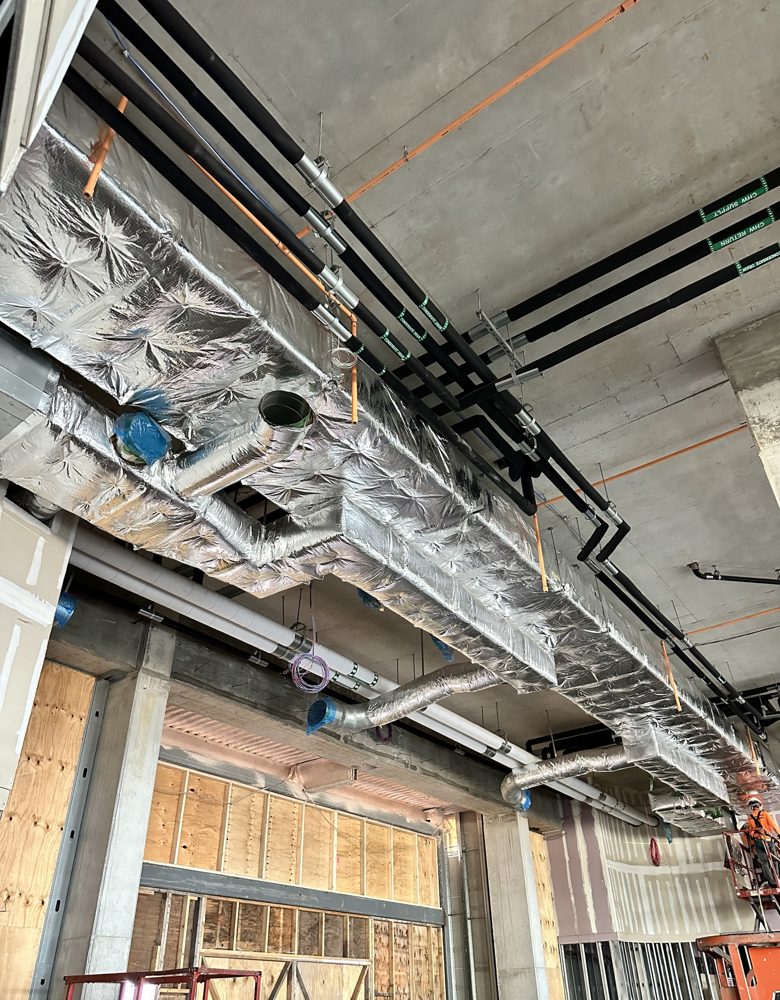 Chilled water and condensate piping, elastomeric with pipe labels; ductwork insulation finished with FSK tape