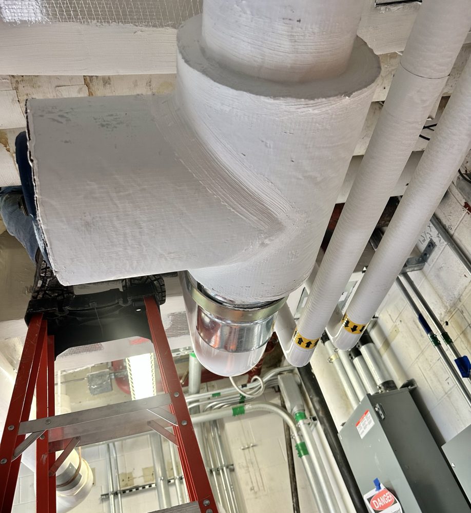 Large chilled water fitting, Foamglas finished with glass cloth and mastic