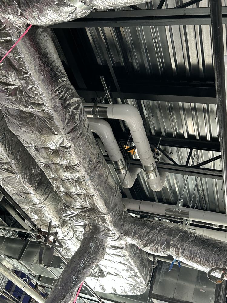 Duct wrap and piping with Foamglas and PVC on elbows